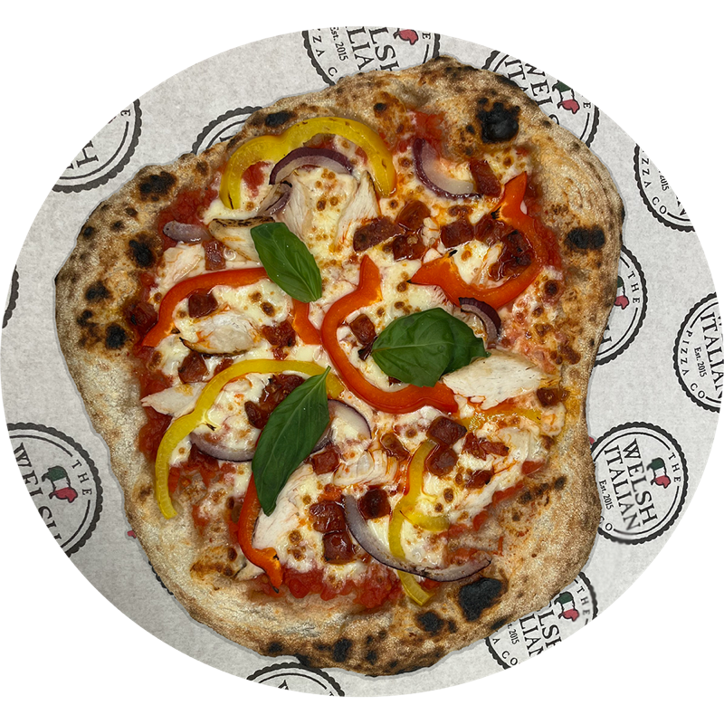 A chicken and chorizo pizza with red and yellow peppers