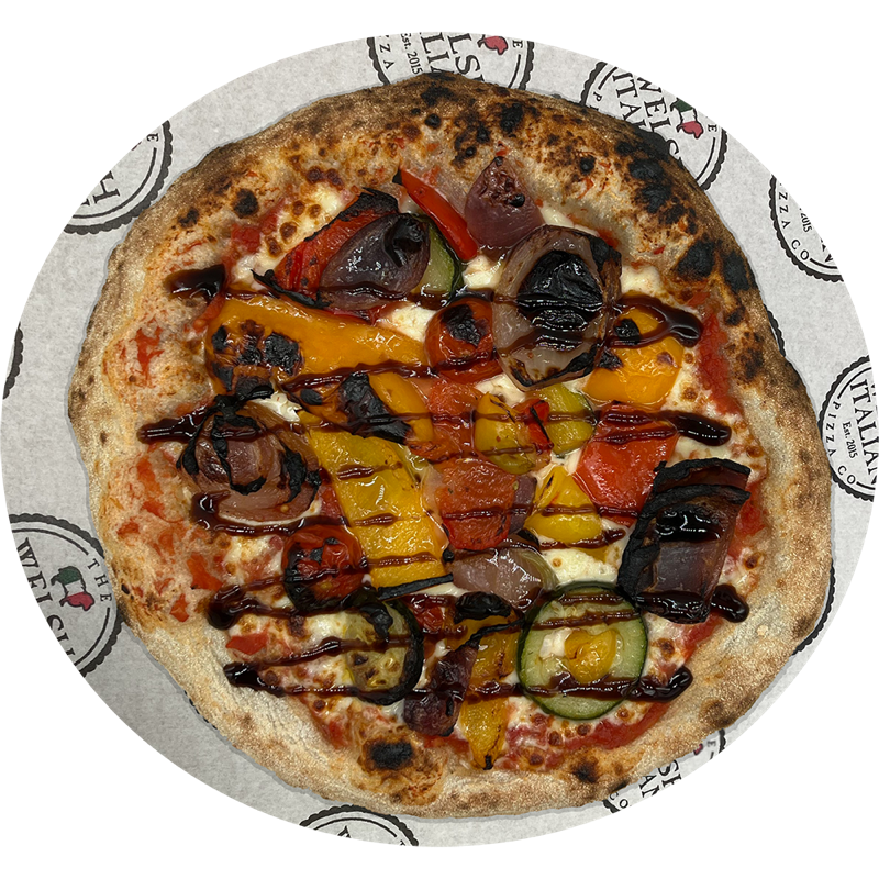 A roast summer vegetable pizza with a balsamic drizzle