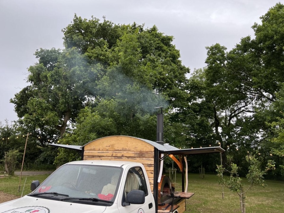 The Welsh Italian Pizza Co pizza truck set up at an outdoor event